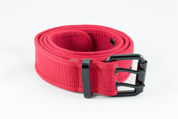 Red fabric belt on white background