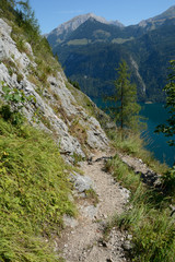 Mountain trail nearby St Bartholoma church at Koenigssee lake.