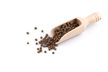 Wooden shovel with black peppercorn