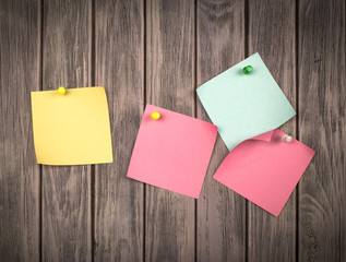 note papers on wooden background