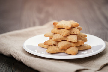 christmas cookies on rustic wood table