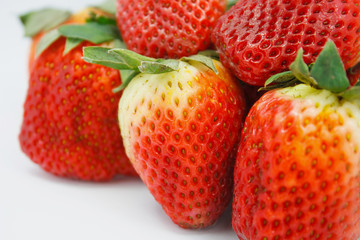 Strawberries isolated over white background