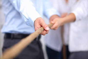 Fototapeta premium Concept image of business team using a rope as an element the