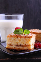 homemade muffins with walnuts, cinnamon and sugar on a dark background