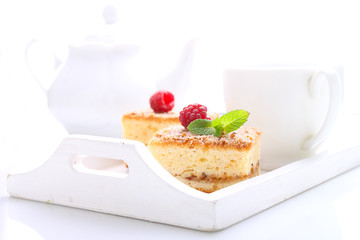 homemade cake with walnuts, cinnamon and sugar on a light background