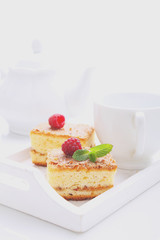 homemade cake with walnuts, cinnamon and sugar on a light background