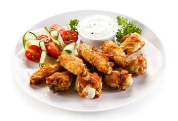 Grilled chicken wings and vegetables 