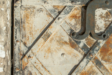 old sheet metal on background of a concrete wall texture