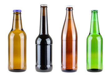 four different beer bottles isolated on white