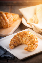 Croissant on wood table