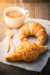 Croissant on wood table
