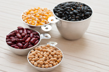 collection set of beans, legumes, peas, lentils on white wooden