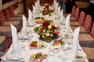 Beautiful decorated wedding table in restaurant