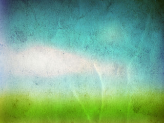 Conceptual green grass and sky old paper