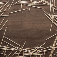 wooden toothpicks on the table background