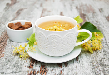 cup of herbal tea with linden flowers