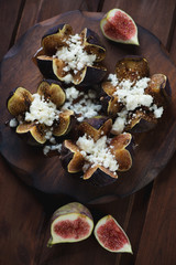 Close-up of fig fruits baked with cottage cheese and honey