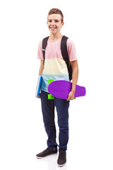 Portrait of a school boy holding a skateboard and notebooks, iso