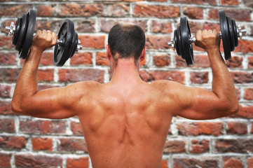 Man working-out with dumbbells