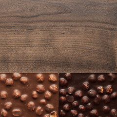 different chocolate bars with whole hazelnuts