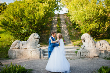 Tender wedding couple background old architecture of castle