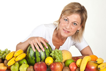 Fototapeta premium Fruits and blond cute woman