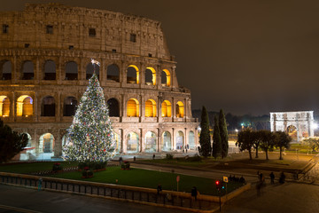 Fototapeta na wymiar Christmas Tree in Colosseum square, Rome Italy