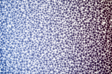 Abstract background from purple styrofoam ball texture