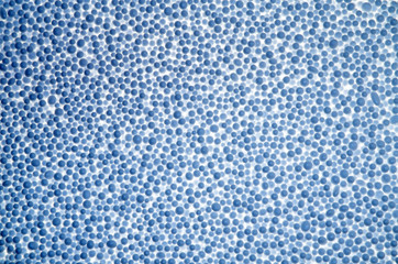 Abstract background from blue styrofoam ball texture