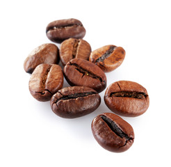 Brown coffee beans isolated on white