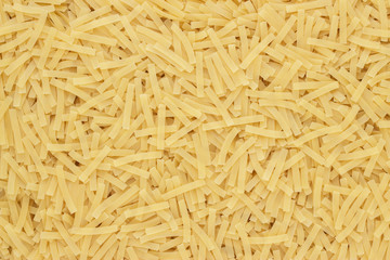 dry uncooked pasta texture background