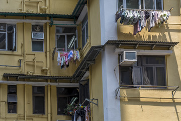 Fototapeta na wymiar Detail of run down apartment buildings in Hong Kong