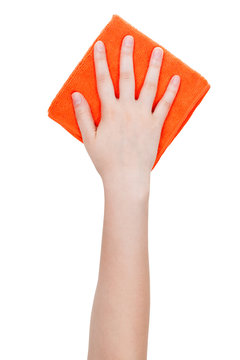 top view of hand with orange cleaning rag isolated