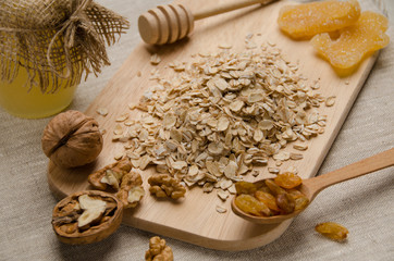 Oatmeal with honey , raisins, ginger and walnuts