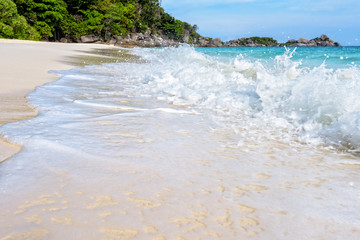 Beautiful landscape blue sea white sand and waves on the beach during summer at Koh Miang island in Mu Ko Similan National Park, Phang Nga province, Thailand