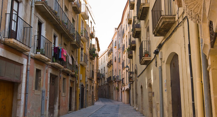 Fototapeta na wymiar Tarragona old town buildings and narrow street, Catalonia, Spain