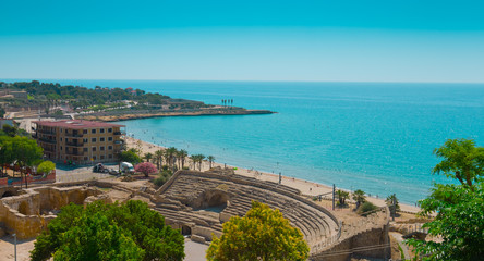 Aerial view of beach and Mediterranean Sea in Tarragona - obrazy, fototapety, plakaty