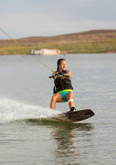 Girl Wakeboarding in Desert Sunshine