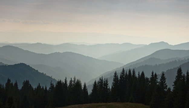 Layers of mountain and haze in the valleys. © vovik_mar