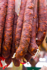 Catalan dry sausages called fuet at Mercat de Sant Josep de la Boqueria market in Barcelona