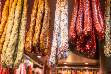 Catalan dry sausages called fuet at Mercat de Sant Josep de la Boqueria market in Barcelona