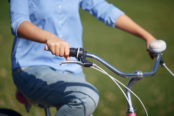 Active girl riding a bicycle 