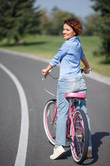 Active girl riding a bicycle 