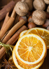 cinnamon sticks, cloves, anise stars,walnuts and slices of dried citrus