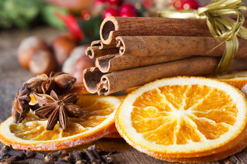 cinnamon sticks, cloves, anise stars and slices of dried citrus
