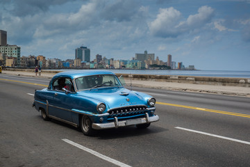 Classic american car drive on street in Havana,Cuba