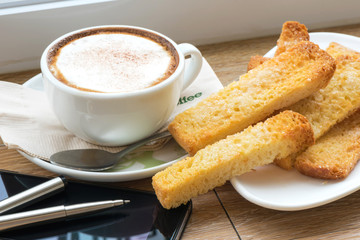 Business work place with cup of coffee