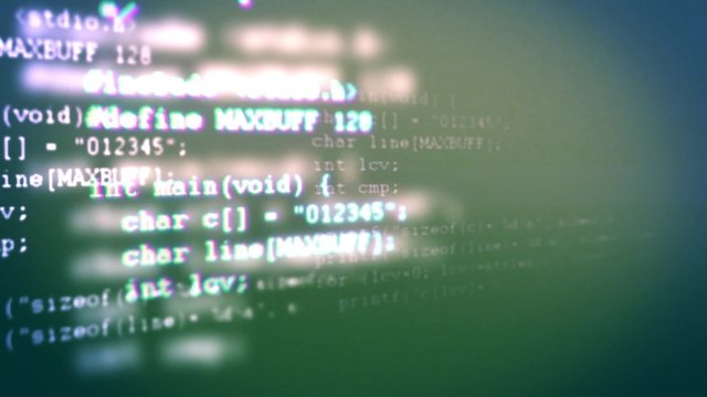  Programming code running down a computer screen terminal