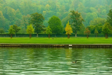 Plexiglas foto achterwand Thames river landscape. Autumn nature. © Voyagerix
