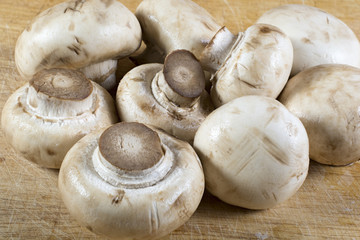 Fresh champignons on a cutting board